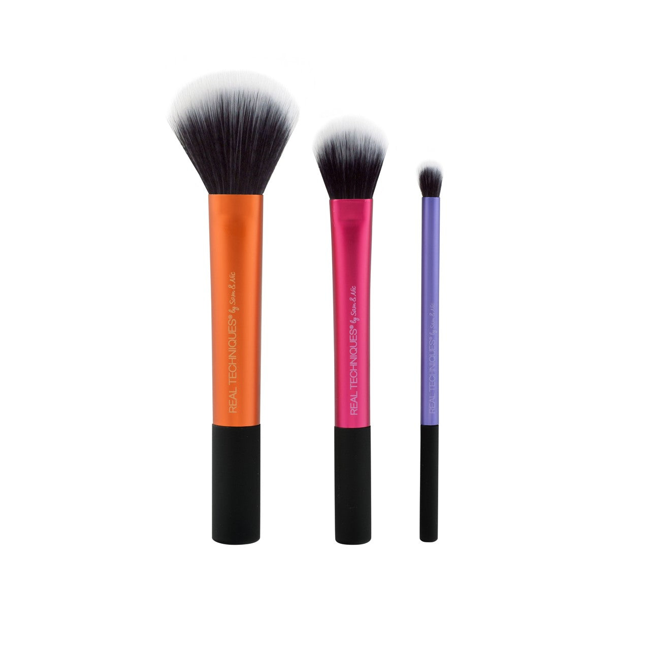 The product shown is the Real Techniques Duo-Fiber Collection, a limited-edition set of three makeup brushes designed for building coverage and achieving a high-definition finish.